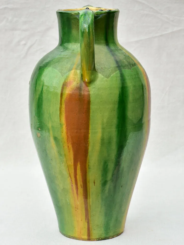 Early 20th Century tall vase with green, brown and yellow glaze 20"