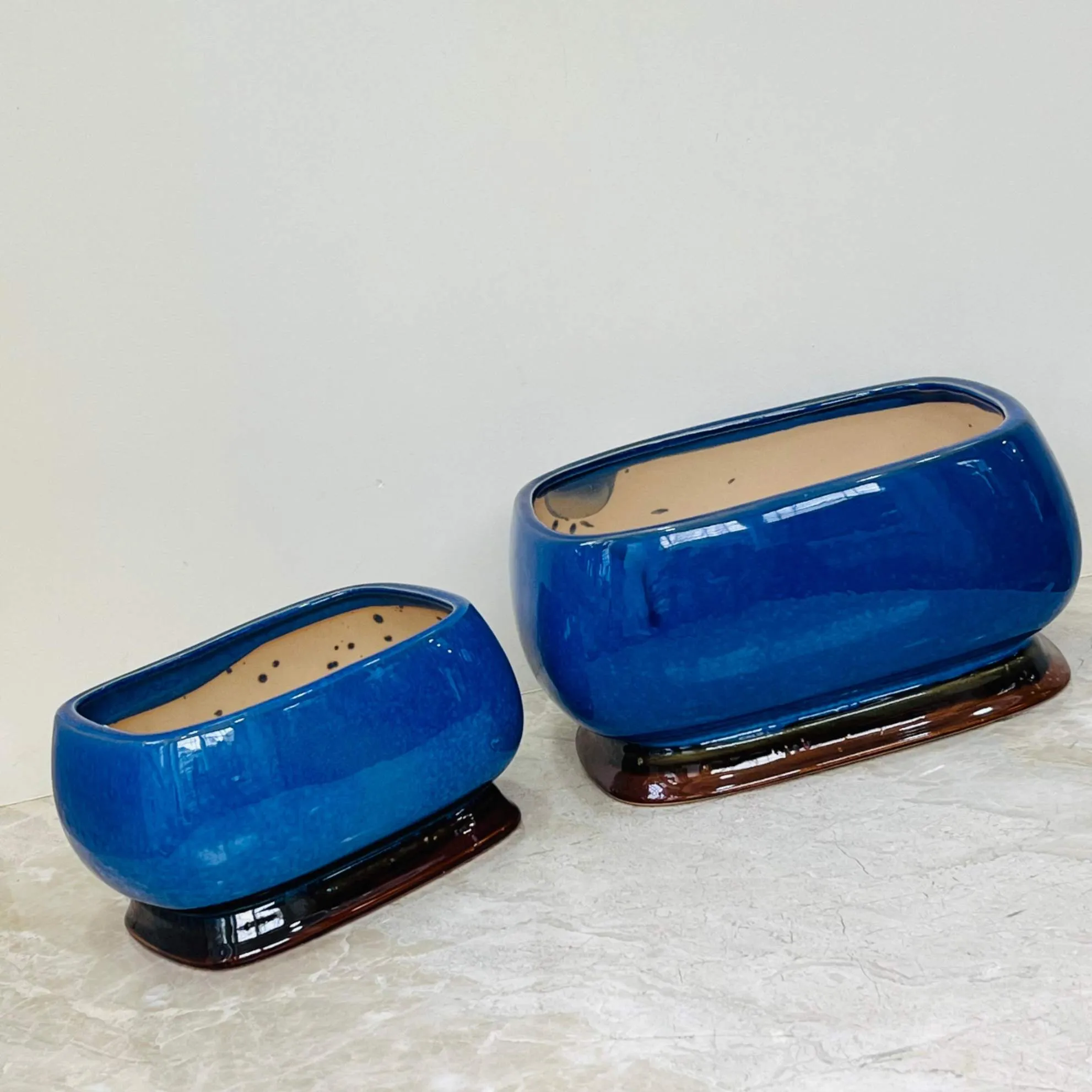 Glossy Blue Oval Ceramic Planter Set Of 2 with Brown Base